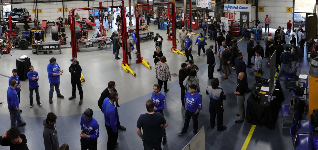 Students interested in becoming automotive technicians visit a career exploration event at Columbus State Community College’s existing automotive technology program space in the college’s Delaware Hall building in March.