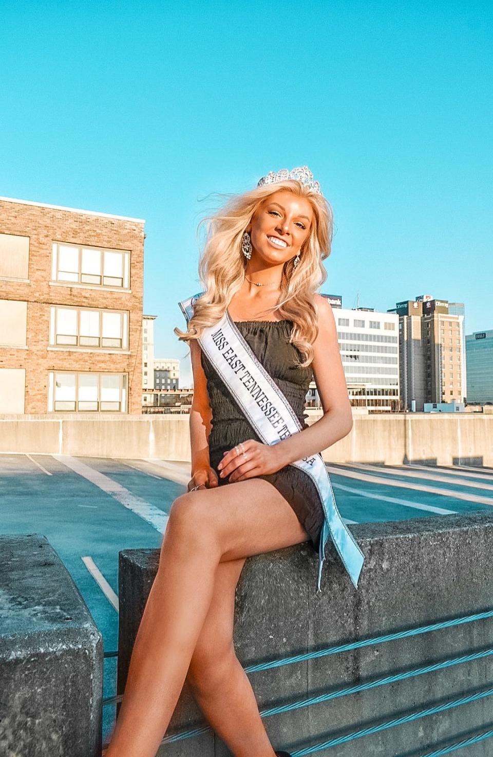 Keelie McLawhorn, 17, poses wearing her 2021 Miss East Tennessee USA crown and sash in downtown Knoxville, Saturday, Jan. 24, 2021.