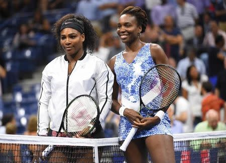 Sep 8, 2015; New York, NY, USA; Serena Williams of the USA (left) and Venus Williams of the USA prior to their match on day nine of the 2015 U.S. Open tennis tournament at USTA Billie Jean King National Tennis Center. Mandatory Credit: Robert Deutsch-USA TODAY Sports