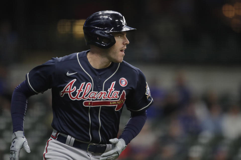 Atlanta Braves' Freddie Freeman watches his two-run home run during the second inning of the team's baseball game against the Milwaukee Brewers on Saturday, May 15, 2021, in Milwaukee. (AP Photo/Aaron Gash)