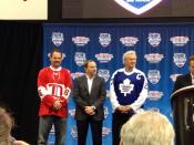 Joe Kocur (left), Gary Bettman and Darryl Sittler (right) show off the NHL Alumni jerseys (Photo by Nick Cotsonika @cotsonika)