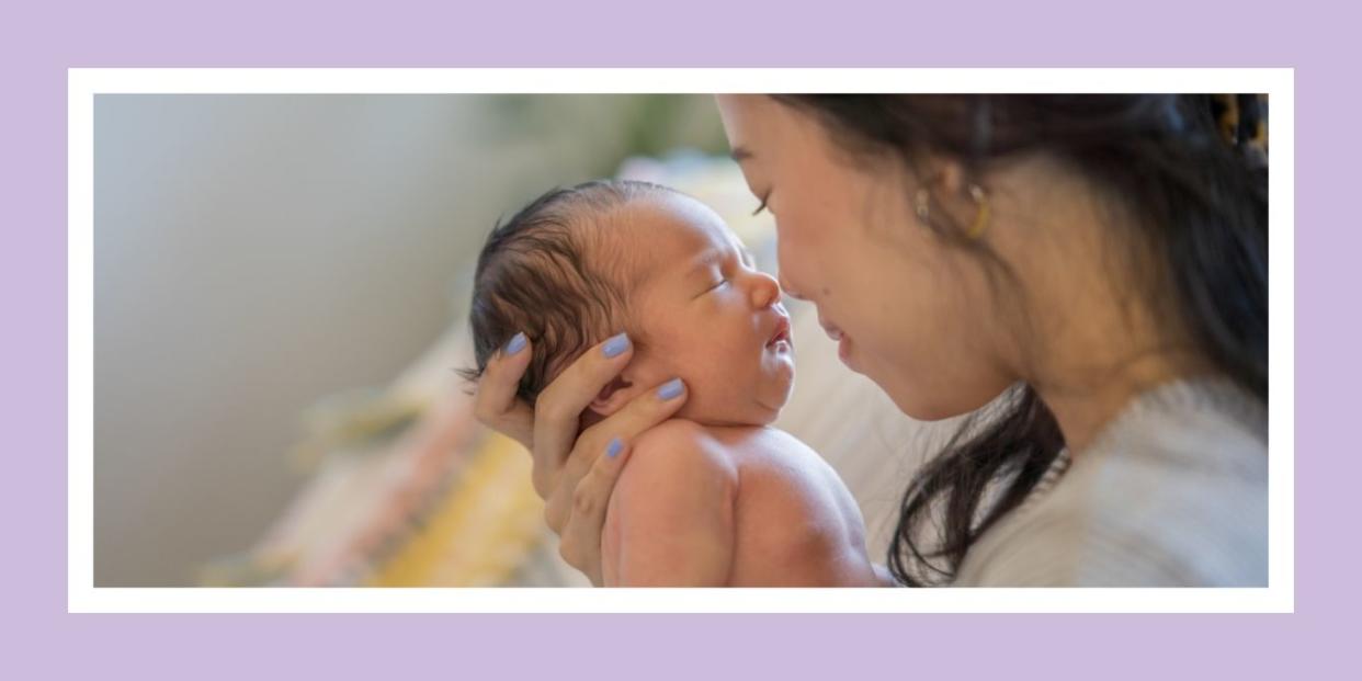 Postpartum mom bonds with newborn