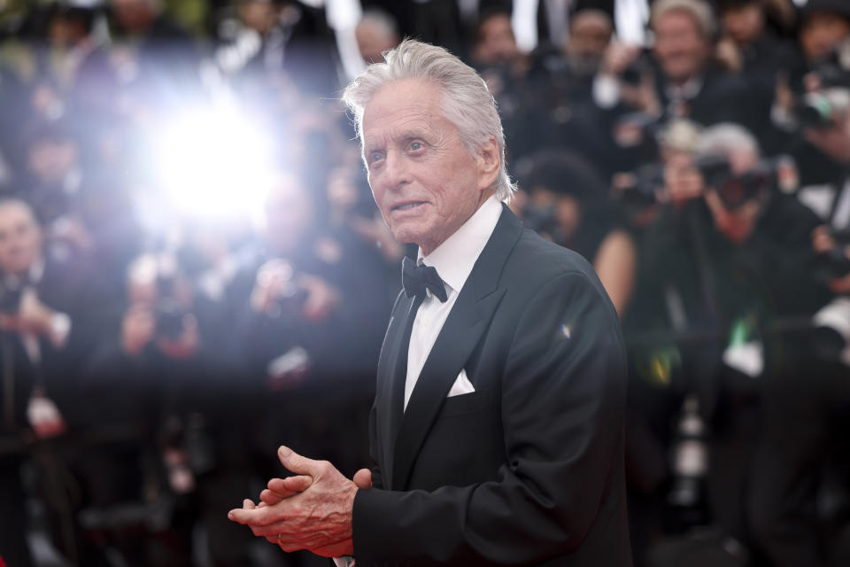 Michael Douglas poses for photographers upon arrival at the opening ceremony and the premiere of the film 'Jeanne du Barry' at the 76th international film festival, Cannes, southern France, Tuesday, May 16, 2023. (Photo by Vianney Le Caer/Invision/AP)