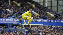 Everton's goalkeeper Jordan Pickford jumps on the pitch during the English Premier League soccer match between Everton and Manchester United at Goodison Park in Liverpool, England, Sunday, March 1, 2020. (AP Photo/Jon Super)