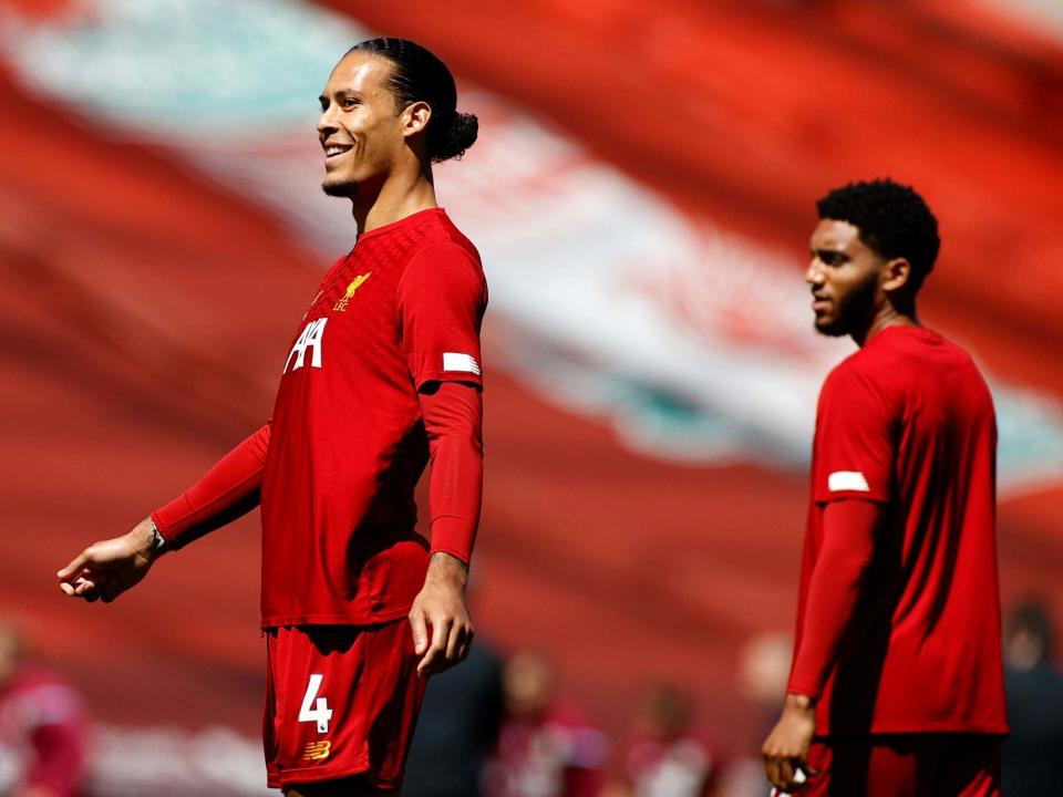 Virgil van Dijk warms up before kick-off at Anfield: PA