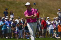 Rory McIlroy, of Northern Ireland, reacts after missing a putt on the first hole during the third round of the Travelers Championship golf tournament at TPC River Highlands, Saturday, June 25, 2022, in Cromwell, Conn. (AP Photo/Seth Wenig)