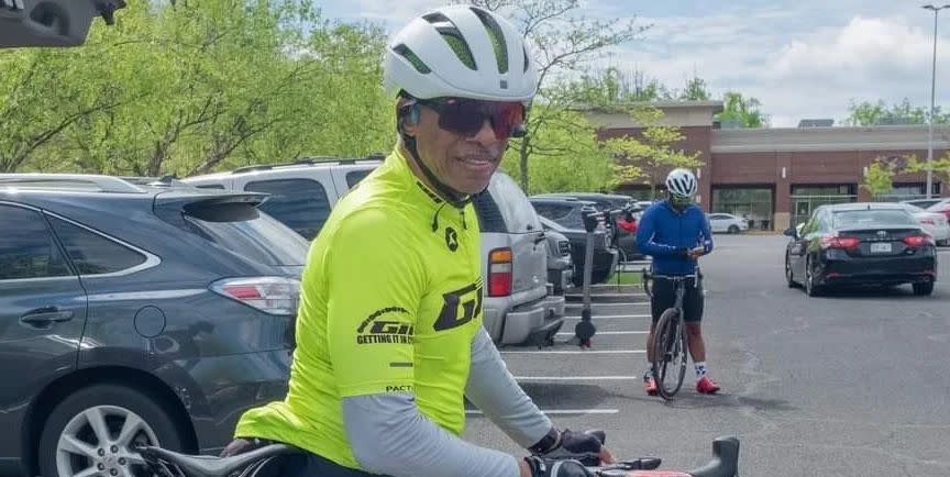 lloyd mason on his bike ready to ride out of the parking lot