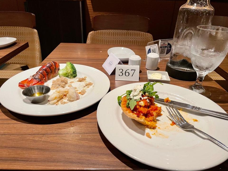 Two entrées on a dinner table on the Carnival Vista.