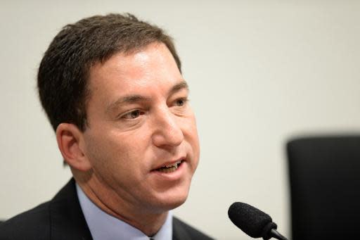 El experiodista del diario británico The Guardian Glenn Greenwald testifica ante un comité del Senado de Brasil que investiga los cargos de espionaje vertidos contra EEUU, el 9 de octubre de 2014 en Brasilia (AFP/Archivos | Evaristo Sa)