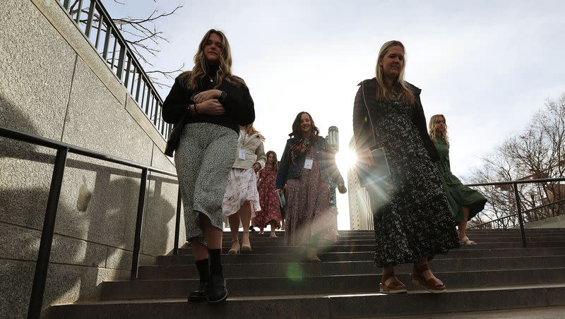 Attendees walk to the Conference Center for the 193rd Annual General Conference of The Church of Jesus Christ of Latter-day Saints in Salt Lake City on Saturday, April 1, 2023.