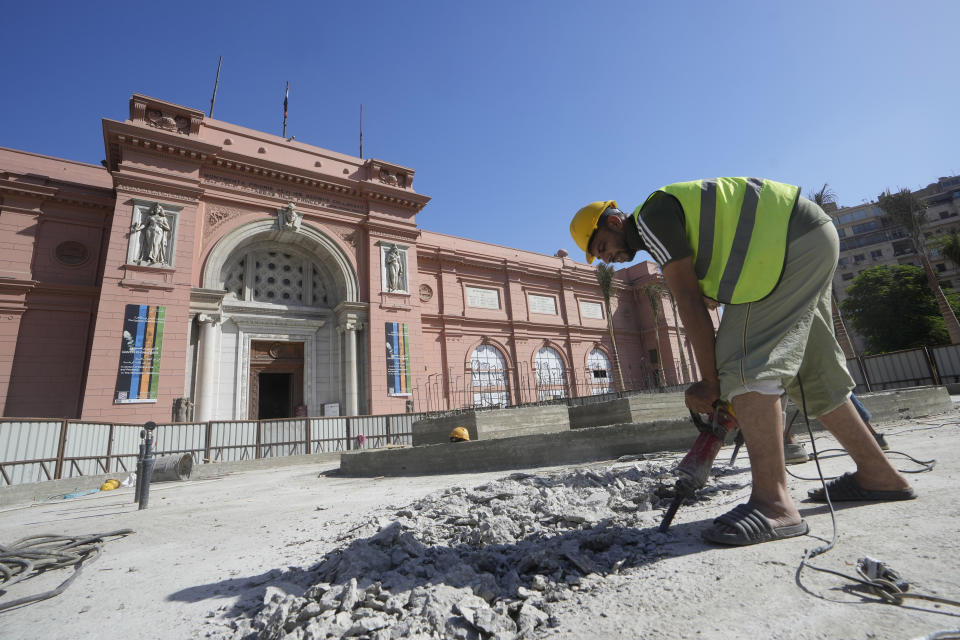 Workers build a new fountain to replace the old one at the garden of the Egyptian museum in Cairo, Egypt, Wednesday, Sept. 27, 2023. The country is aiming at reaching 30 million visitors by 2028, as its once-thriving tourism sector has begun to recover from the fallout of the coronavirus pandemic and the grinding war in Europe, Egypt's Tourism and Antiquities Minister Ahmed Issa said during an interview with the Associated Press. (AP Photo/Amr Nabil)