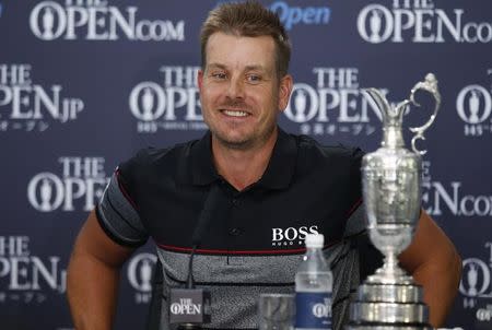 Golf - British Open - Sweden's Henrik Stenson with the Claret Jug during a news conference after winning the British Open golf championship - Royal Troon, Scotland, Britain - 17/07/2016. REUTERS/Paul Childs