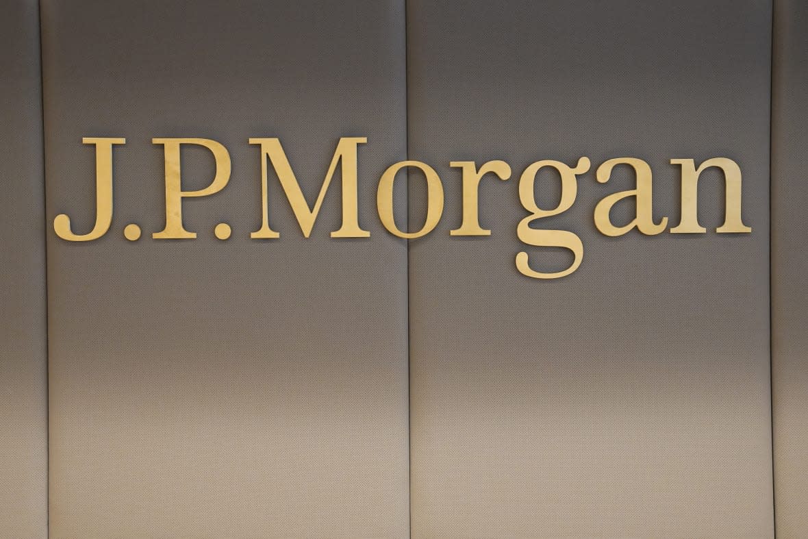 FILE – The logo of JPMorgan bank is pictured at the new French headquarters of JP Morgan bank, Tuesday, June 29, 2021, in Paris. JPMorgan Chase is defending itself against a lawsuit by the U.S. Virgin Islands accusing it of empowering Jeffrey Epstein to abuse teenage girls. Lawyers for the giant bank said in court papers Tuesday, May 23, 2023, that it was the islands that enabled the financier to commit his crimes. (AP Photo/Michel Euler, Pool, File)