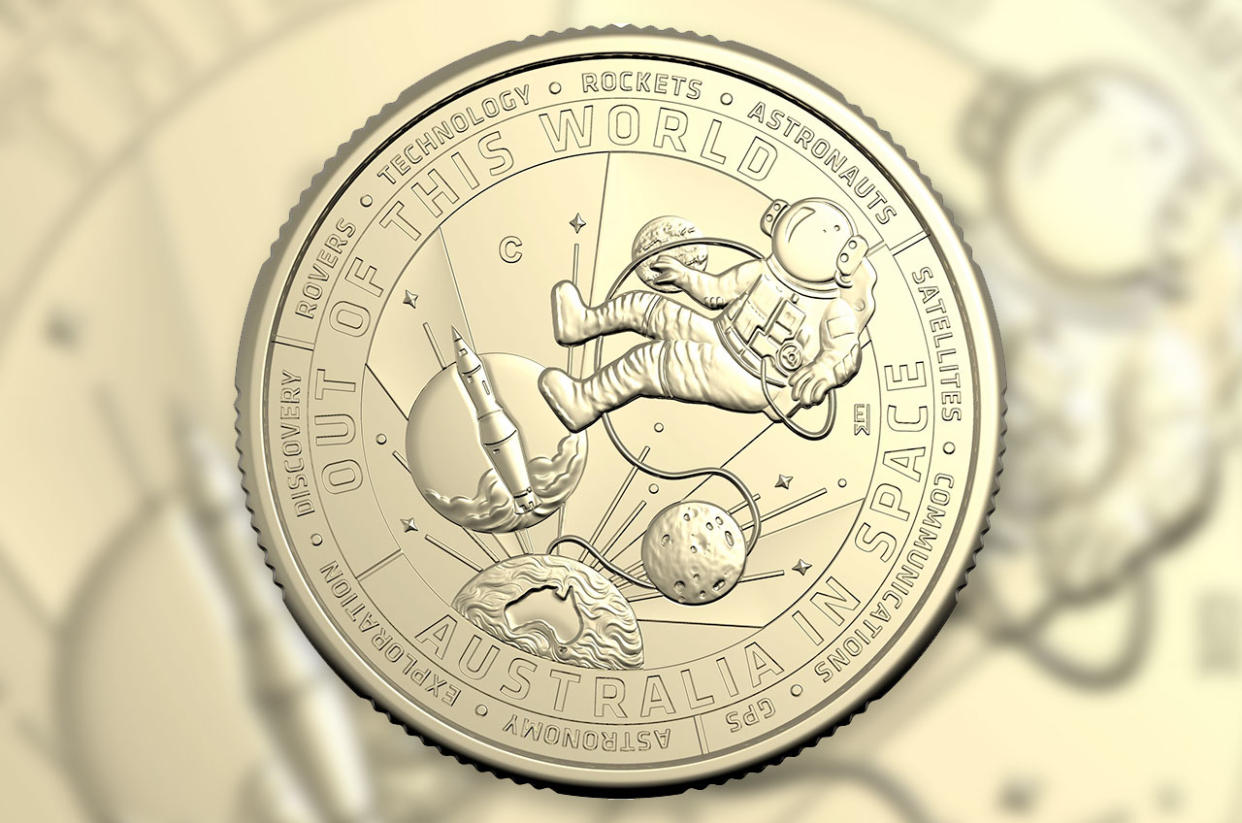  Illustration of a coin's reverse with an astronaut and rocket launch depicted  . 