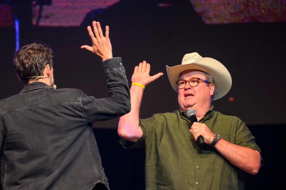 Big Slick host Eric Stonestreet, right, high-fives magician Blake Vogt after his performance.