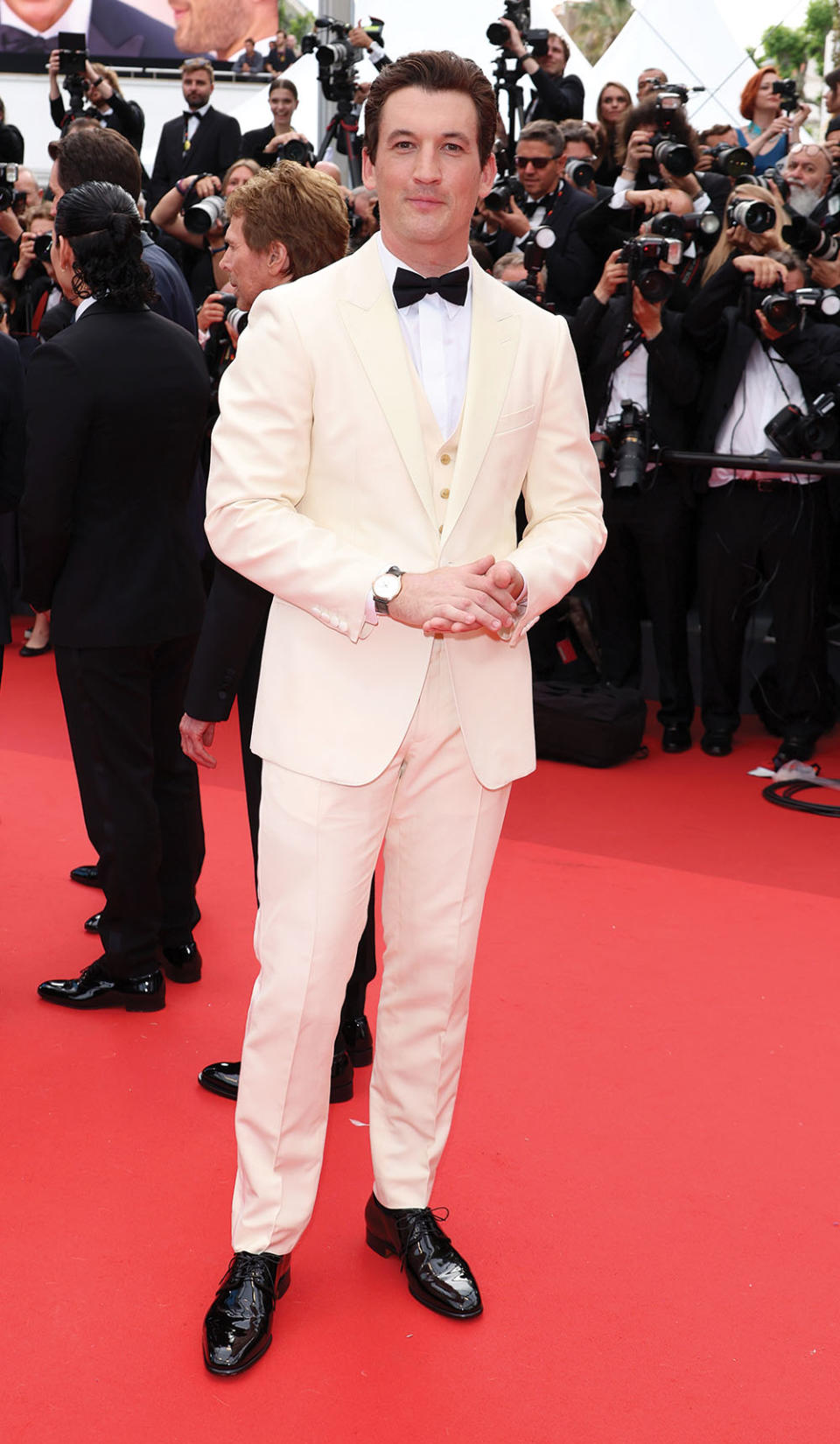For the Top Gun: Maverick premiere at Cannes, the Ferreiras dressed Miles Teller in a cream-colored Celine tux