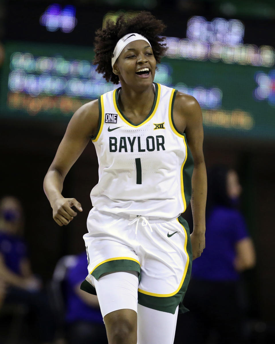 FILE - Baylor forward NaLyssa Smith reacts to her score against Northwestern in the first half of an NCAA college basketball game in Waco, Texas, in this Friday, Dec. 18, 2020, file photo. Smith made The Associated Press All-America first team, announced Wednesday, March 17, 2021. (Rod Aydelotte/Waco Tribune-Herald via AP, FIle)