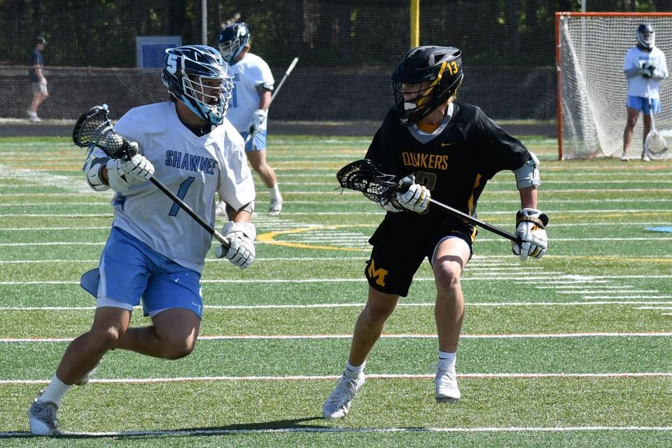 Shawnee senior Matt Welsey drives against Moorestown junior Jack Bertino