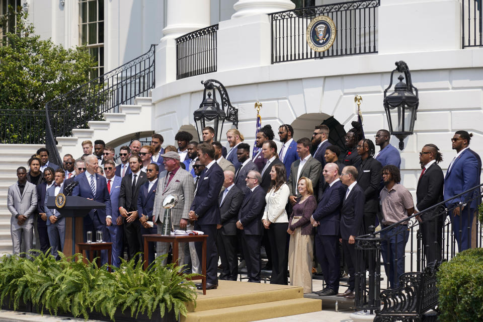 President Joe Biden, surrounded by members of the Tampa Bay Buccaneers, speaks during a ceremony on the South Lawn of the White House, in Washington, Tuesday, July 20, 2021, where the president honored the Super Bowl Champion Tampa Bay Buccaneers for their Super Bowl LV victory. (AP Photo/Manuel Balce Ceneta)