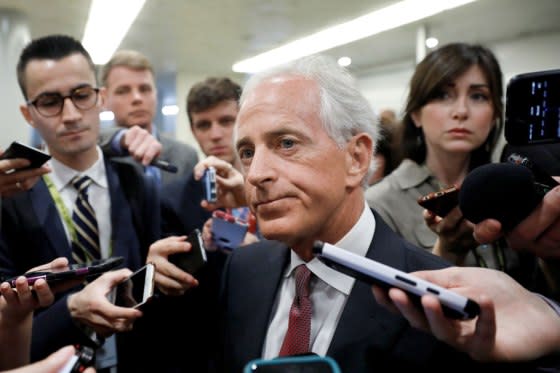 Republican Senator Bob Corker, surrounded by reporters on May 16, sharply criticized a White House in growing disarray