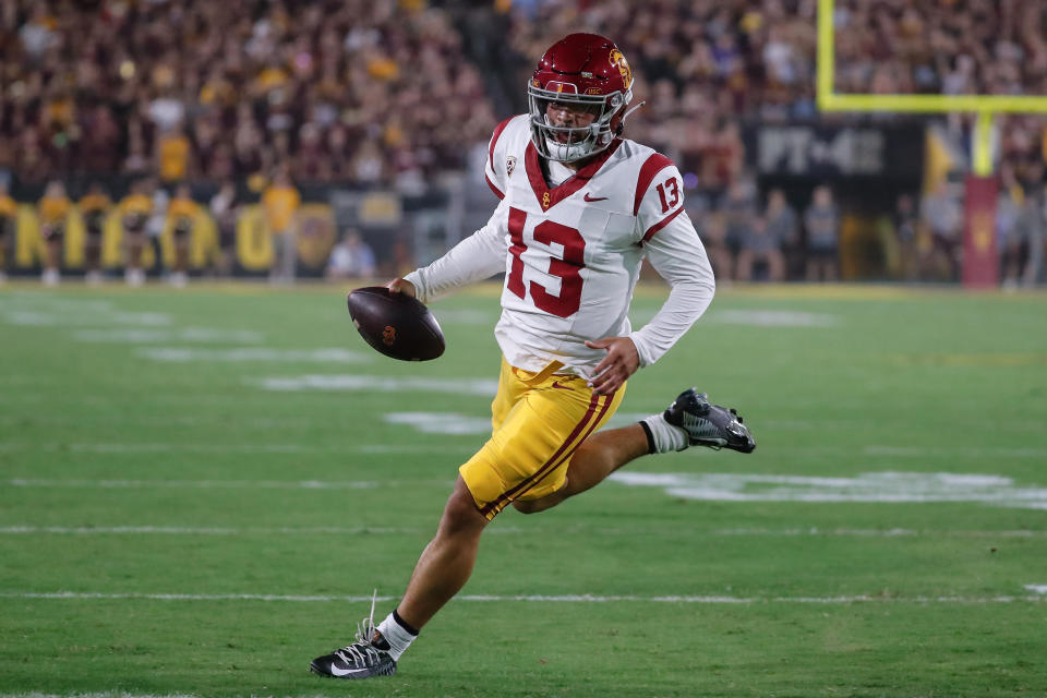 TEMPE, AZ - SEPTEMBER 23:  USC Trojans quarterback Caleb Williams (13) runs the ball during the college football game between the USC Trojans and the Arizona State Sun Devils on September 23, 2023 at Mountain America Stadium in Tempe, Arizona. (Photo by Kevin Abele/Icon Sportswire via Getty Images)