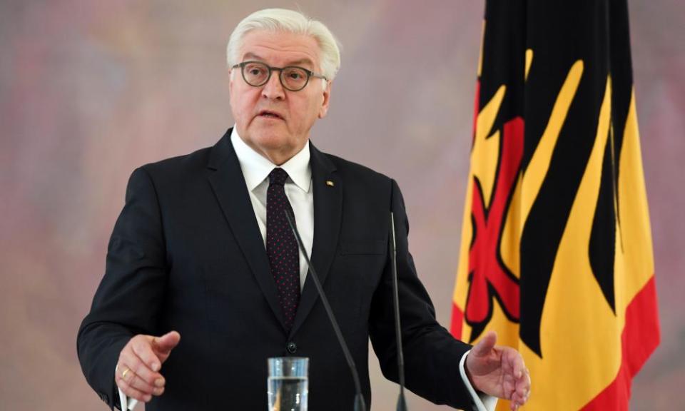 Frank-Walter Steinmeier briefs the press after his meeting with Angela Merkel on Monday.