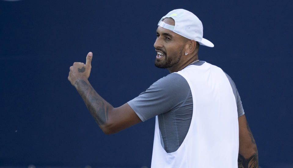 Nick Kyrgios, of Australia, reacts during his match against compatriot Alex de Minaur during the National Bank Open tennis tournament Thursday, Aug. 11, 2022, in Montreal. (Paul Chiasson/The Canadian Press via AP)