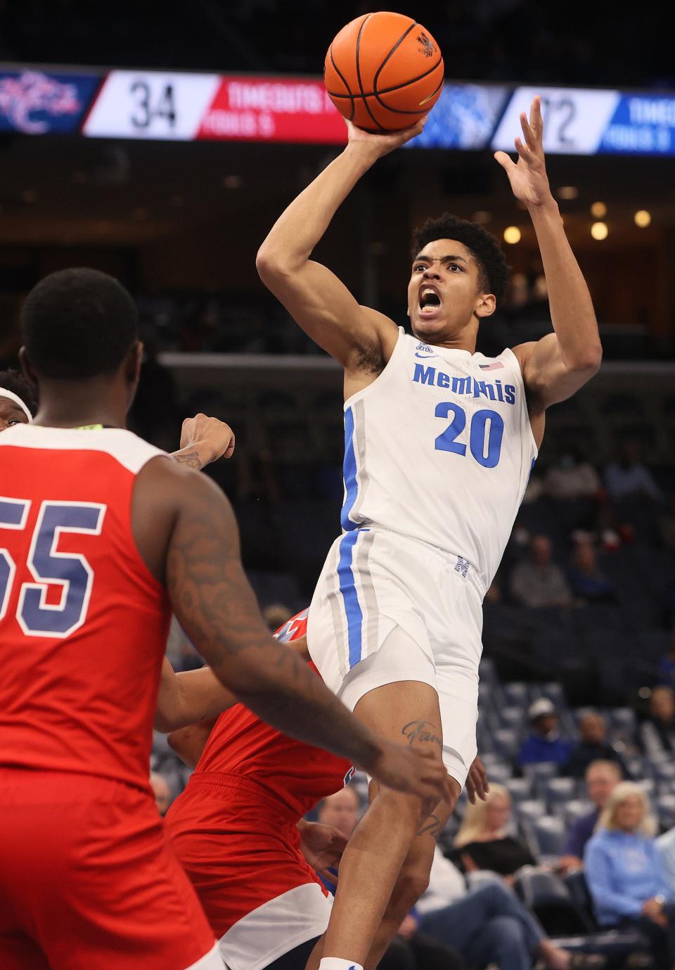 Memphis Tigersforward Josh Minott  shoots the ball against the Lane Dragons during their game at FedExForum on Sunday, Oct. 31, 2021. 