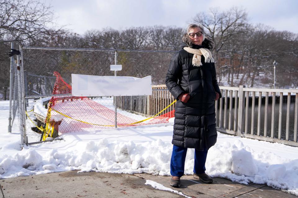 Des Moines resident Patricia Prijatel stands for a photo Friday, Feb. 16, 2024, near the "Greenwood Pond: Double Site" art installation at Greenwood Park in Des Moines.