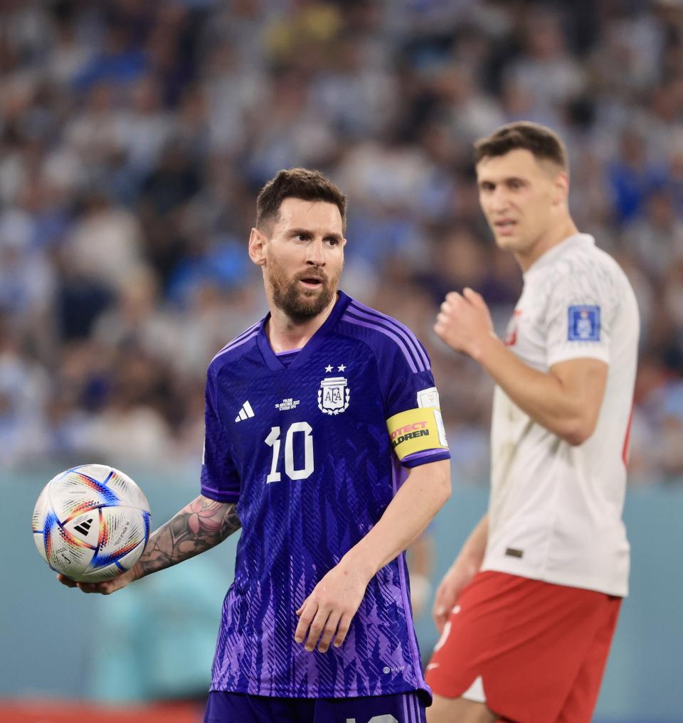 Lionel Messi (pictured) holding the ball at the World Cup.