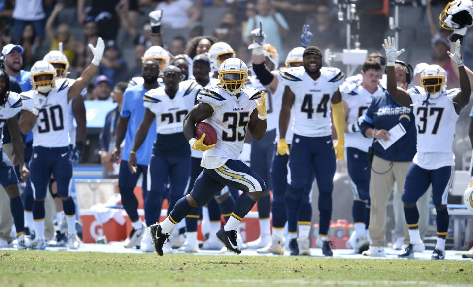 Los Angeles Chargers running back Troymaine Pope (35) returns a punt for a touchdown against the New Orleans Saints during the first half of a preseason NFL football game Sunday, Aug. 18, 2019, in Carson, Calif. (AP Photo/Kelvin Kuo )