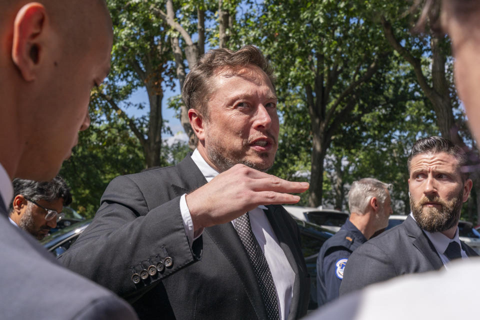 Elon Musk, CEO of X, the company formerly known as Twitter, speaks to the media after attending a closed-door gathering of leading tech CEOs to discuss the priorities and risks surrounding artificial intelligence and how it should be regulated, on Capitol Hill in Washington, Wednesday, Sept. 13, 2023.(AP Photo/Jacquelyn Martin)