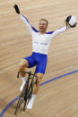 BEIJING - AUGUST 19: Chris Hoy of Great Britain celebrates the gold medal after defeating Jason Kenny of Great Britain in the Men's Sprint Finals in the track cycling event at the Laoshan Velodrome on Day 11 of the Beijing 2008 Olympic Games on August 19, 2008 in Beijing, China. (Photo by Jamie Squire/Getty Images)