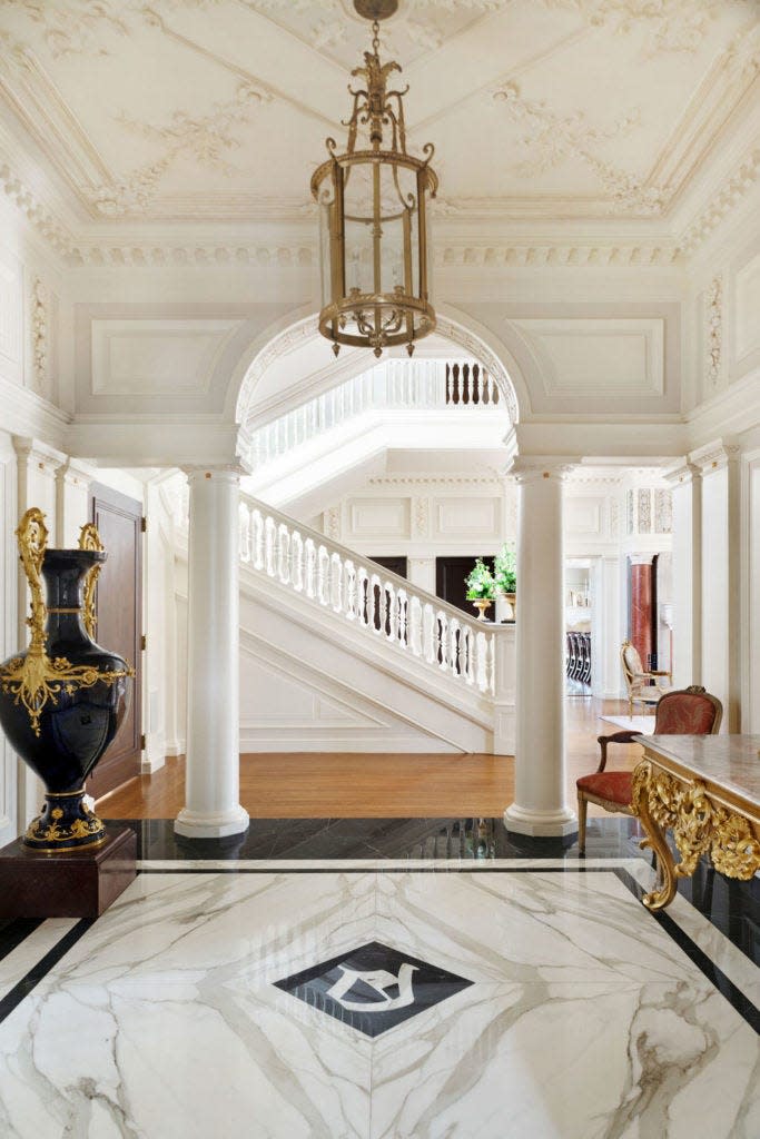 The grand hall of the Driehaus Estate leads to the great room with 30-foot ceilings.