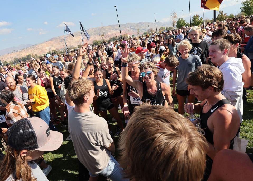 Mountain View celebrate after winning the 4A boys cross-country state championship at the Regional Athletic Complex in Rose Park on Tuesday, Oct. 24, 2023. | Jeffrey D. Allred, Deseret News