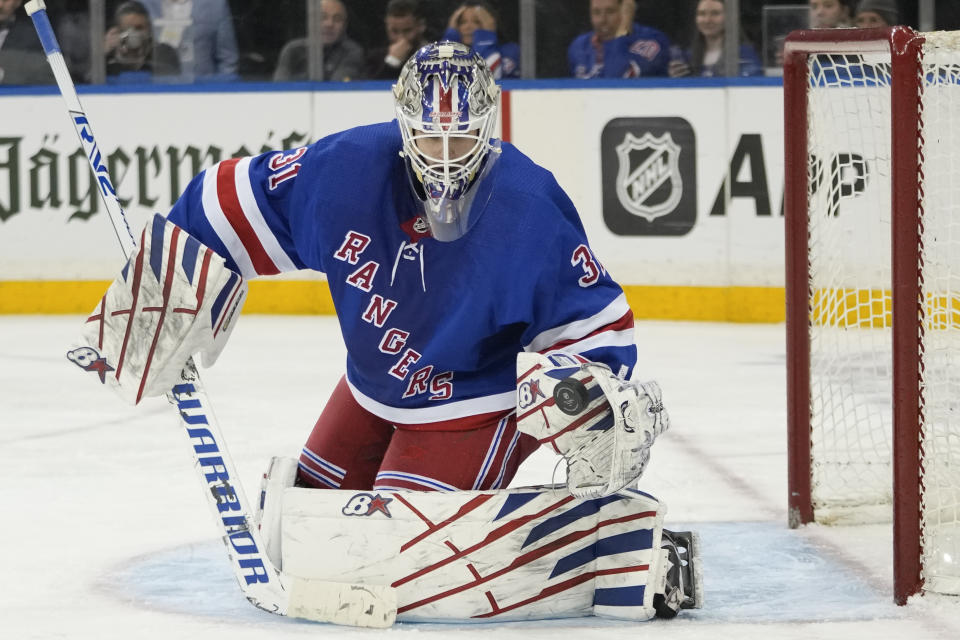 New York Rangers goaltender Igor Shesterkin makes a save against the Carolina Hurricanes during the third period of an NHL hockey game, Tuesday, March 21, 2023, at Madison Square Garden in New York. The Hurricanes won 3-2. (AP Photo/Mary Altaffer)