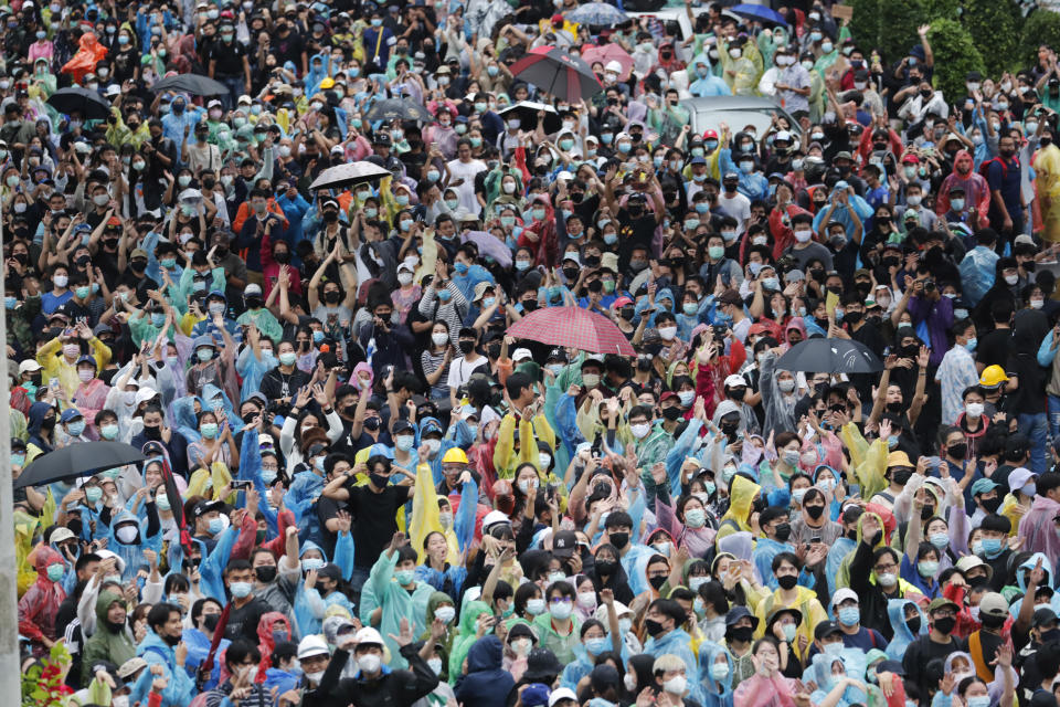 Pro-democracy protesters gather during a protest near a main train station in Bangkok, Thailand, Saturday, Oct. 17, 2020. The authorities in Bangkok shut down mass transit systems and set up roadblocks Saturday as Thailand's capital braced for a fourth straight day of determined anti-government protests. (AP Photo/Sakchai Lalit)