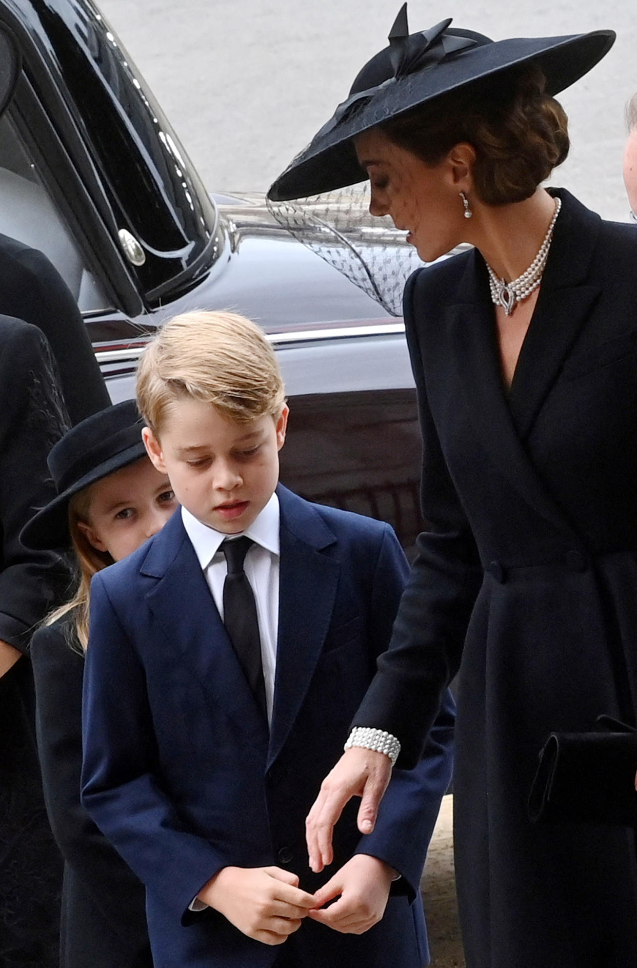 Kate Middleton, Princess of Wales, with Princess Charlotte and Prince George at Queen Elizabeth's funeral (Geoff Pugh / AFP Pool via Getty Images)