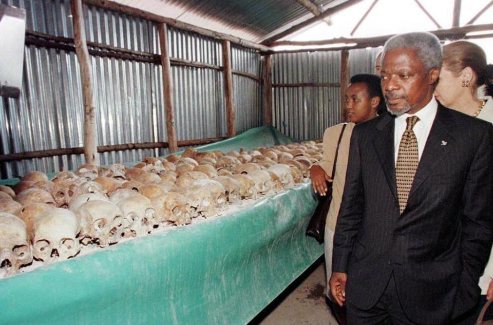 Kofi Annan walks by skulls at a memorial to the Rwandan genocide, which the UN faced criticism for failing to halt (AFP/Getty Images)