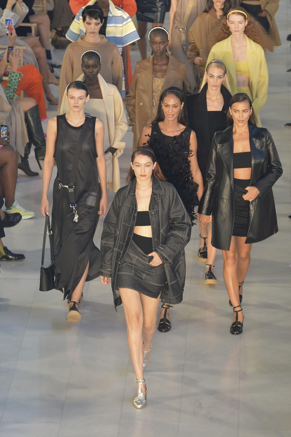 Gigi Hadid leads a group of models for the finale of Max Mara’s Spring ’22 runway show. - Credit: Agostino Fabio / MEGA