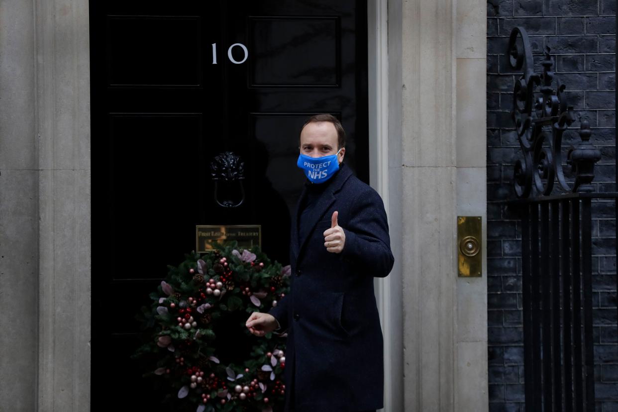 Britain's Health Secretary Matt Hancock gestures as he arrives at Downing Street in London on Wednesday, Dec. 2, 2020. U.K. Health Secretary Matt Hancock on Wednesday thanked scientists from Pfizer and BioNTech after the approval of their COVID-19 vaccine for emergency use by the country's drugs regulator. Speaking earlier Hancock gave details of how the vaccine would be distributed from the beginning of next week.