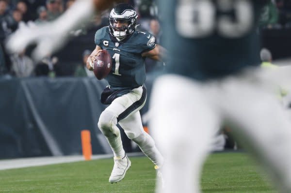 Philadelphia Eagles quarterback Jalen Hurts carries the ball against the San Francisco 49ers on Sunday at Lincoln Financial Field in Philadelphia. Photo by Laurence Kesterson/UPI