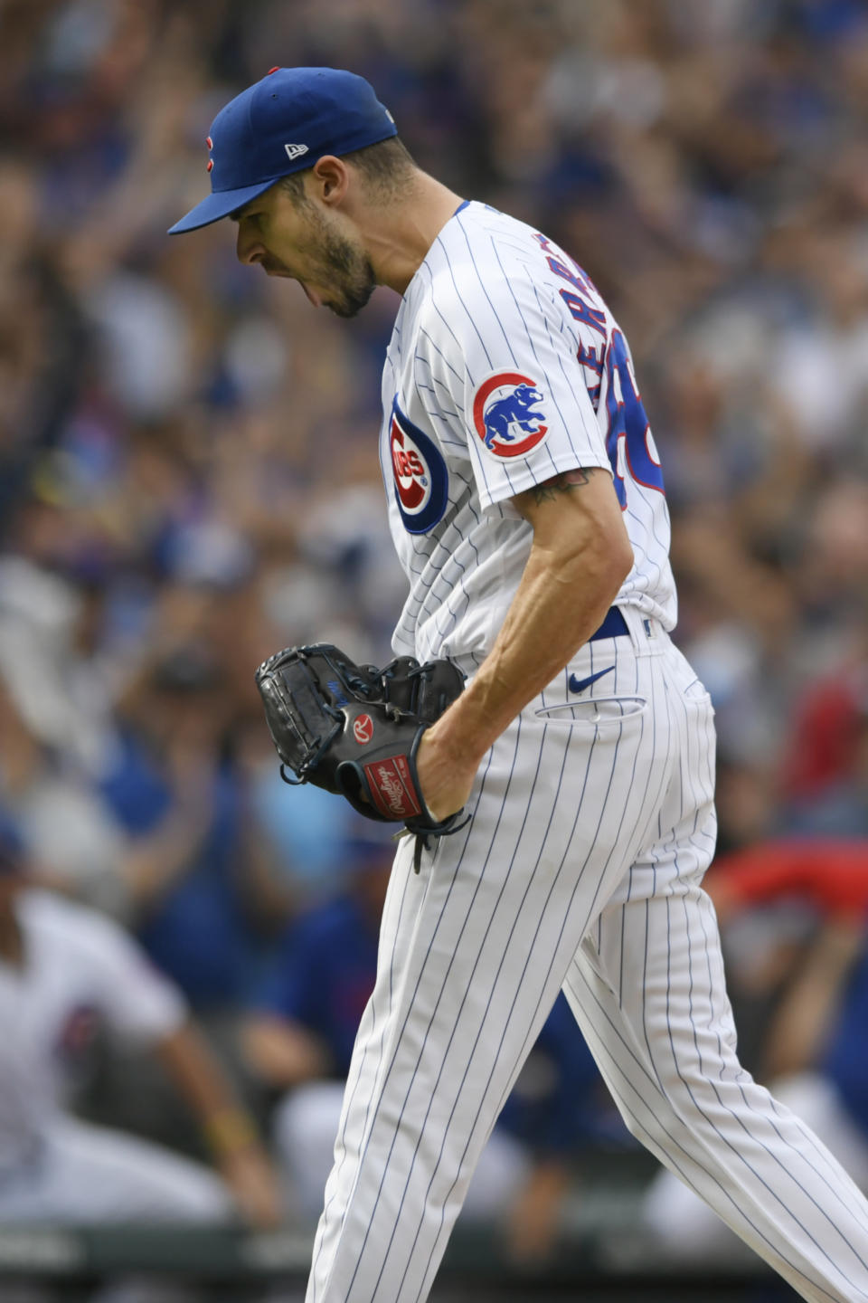 Chicago Cubs closing pitcher Julian Merryweather celebrates after defeating the Colorado Rockies in a baseball game Sunday, Sept. 24, 2023, in Chicago. (AP Photo/Paul Beaty)