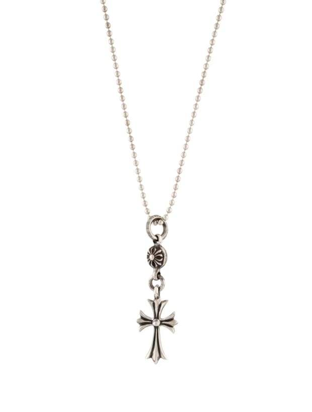 <p>Chrome Hearts Vintage Cross Pendant Necklace, $645, <a href="https://www.therealreal.com/products/jewelry/necklaces/pendant-necklace/chrome-hearts-vintage-cross-pendant-necklace-dq21e" rel="nofollow noopener" target="_blank" data-ylk="slk:available here;elm:context_link;itc:0;sec:content-canvas" class="link ">available here</a></p>