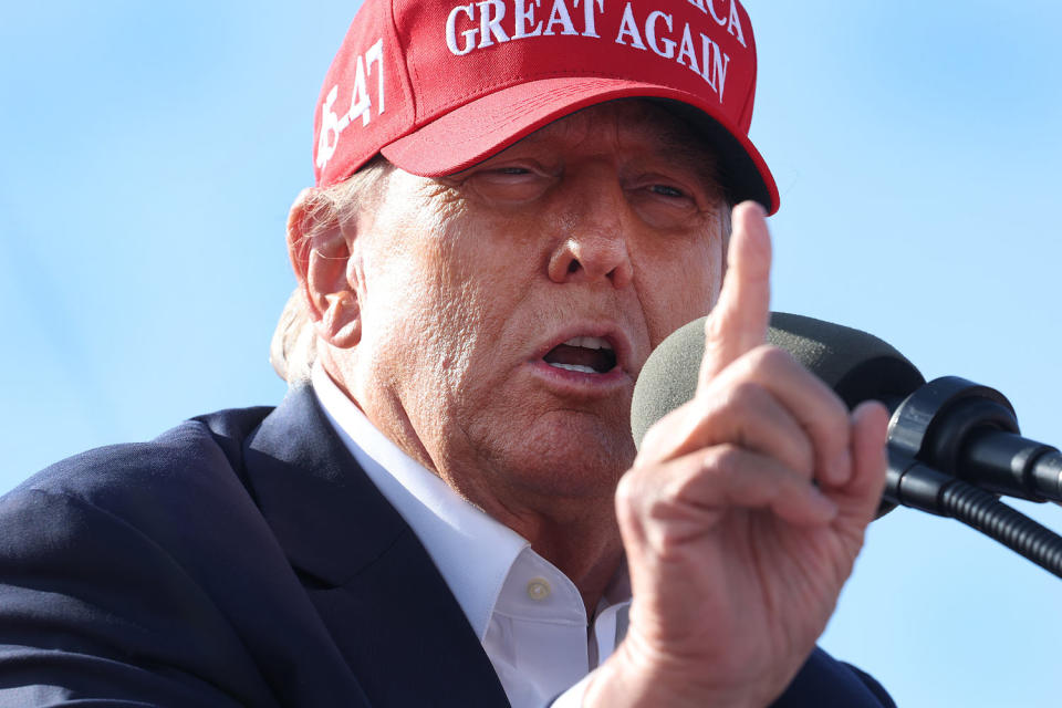 Republican presidential candidate former President Donald Trump  speaks to supporters during a rally at the Dayton International Airport on March 16, 2024 in Vandalia, Ohio.   (Scott Olson / Getty Images)