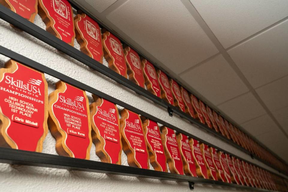 SkillsUSA awards lining a wall of the Collinsville Area Vocational Center in Collinsville, Ill. on Sept. 21, 2023. The CAVC provides vocational training ranging from auto repair and precision machining to certified nursing and dental assisting.