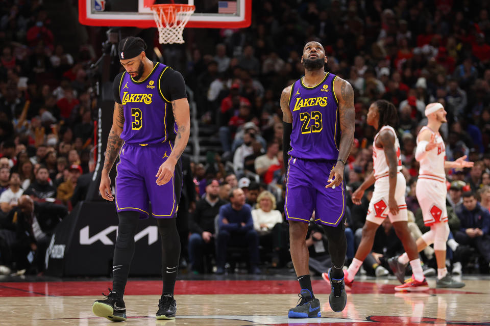 CHICAGO, ILLINOIS - DECEMBER 20: Anthony Davis #3 and LeBron James #23 of the Los Angeles Lakers look on against the Chicago Bulls during the second half at the United Center on December 20, 2023 in Chicago, Illinois. NOTE TO USER: User expressly acknowledges and agrees that, by downloading and or using this photograph, User is consenting to the terms and conditions of the Getty Images License Agreement.  (Photo by Michael Reaves/Getty Images)