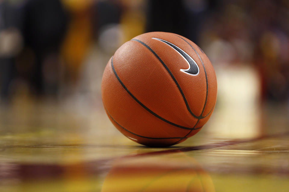 A basketball sits on the court during the first half of an NCAA college basketball game between Iowa State and Northern Illinois, Tuesday, Nov. 12, 2019, in Ames, Iowa. (AP Photo/Charlie Neibergall)