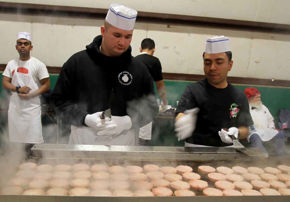 Thousands of sausae patties are cooked at the University Kiwanis Club's Annual Pancake Festival Saturday, Jan. 25, 2020, at the J.S. Bridwell Agricultural Center.