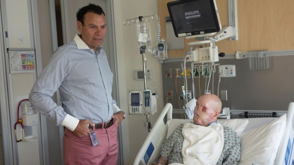 Surgeon Dr. Eduardo Rodriguez with Aaron James before his whole-eye and partial face transplant. - NYU Langone Health